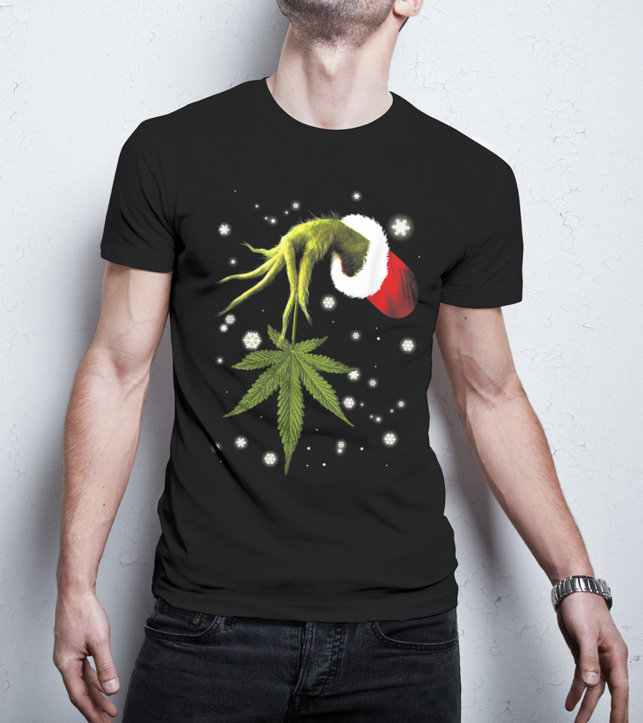 Grinch Hand Holding Cannabis Leaf With Santa Hat And Snowflakes T-Shirt