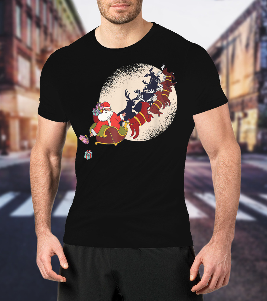 Santa Claus Flying With Reindeers Silhouette Under Full Moon Carrying Gift Sack T-Shirt