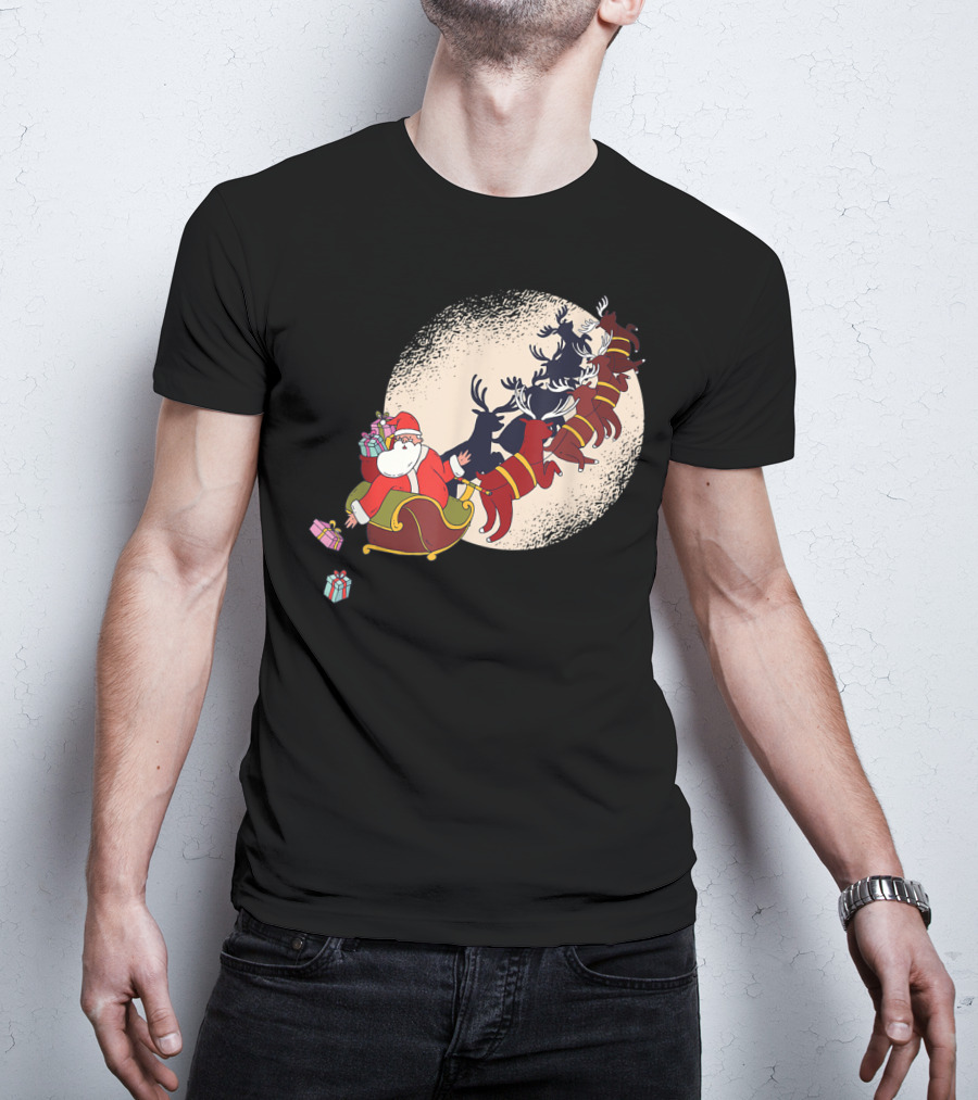 Santa Claus Flying With Reindeers Silhouette Under Full Moon Carrying Gift Sack T-Shirt