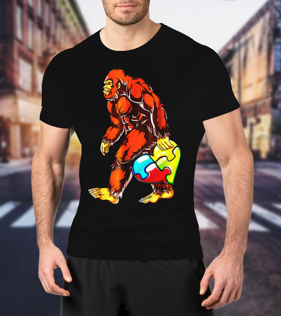 Bigfoot Holding Heart-Shaped Puzzle Piece For Autism Awareness T-Shirt