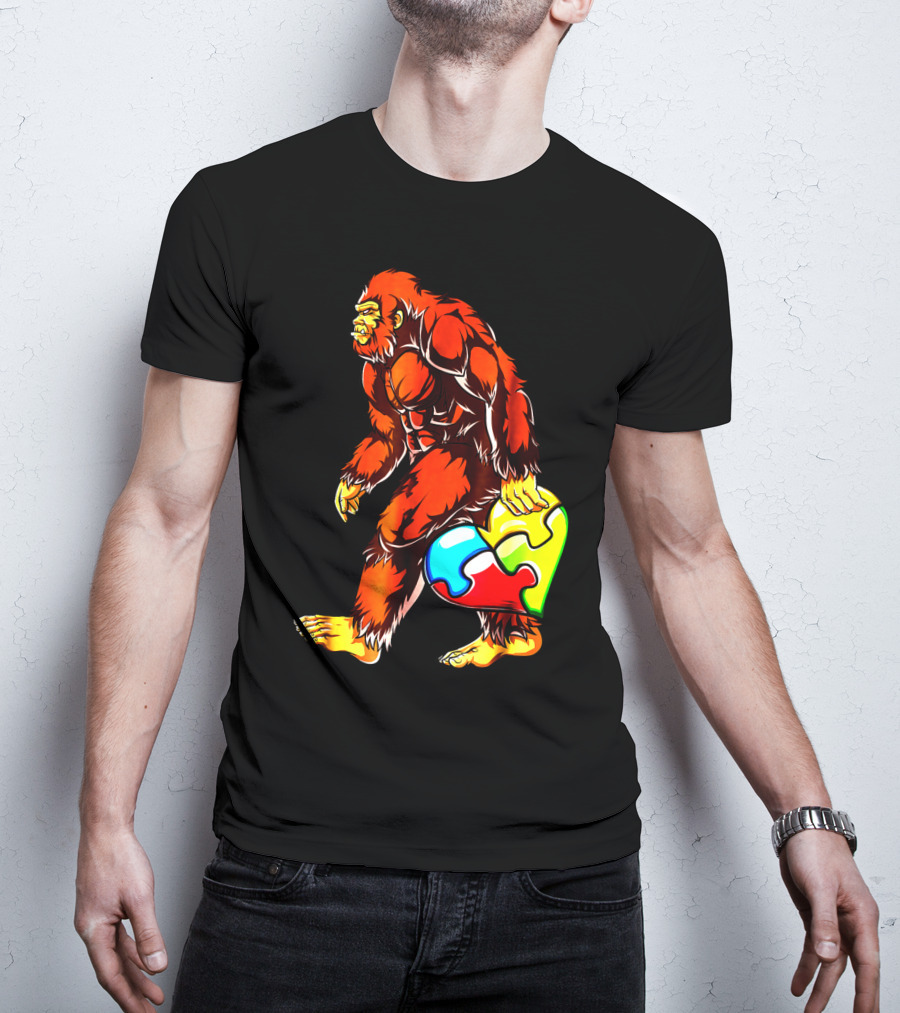 Bigfoot Holding Heart-Shaped Puzzle Piece For Autism Awareness T-Shirt