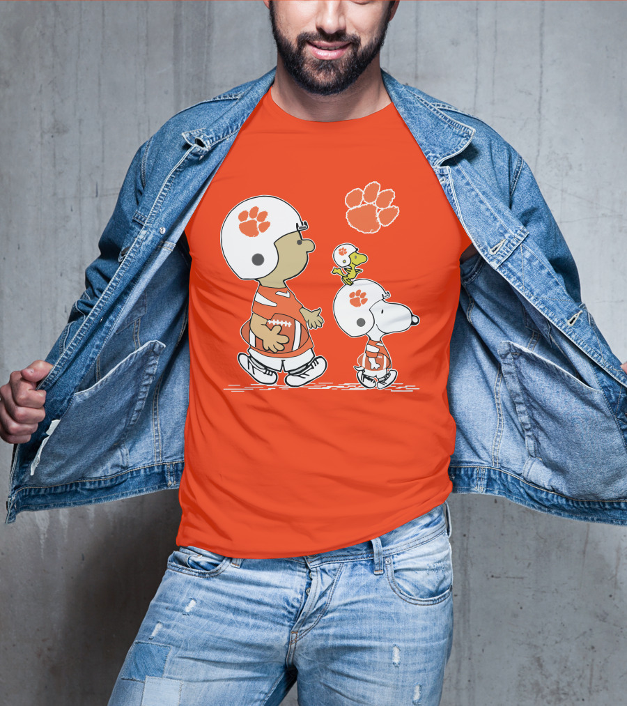 Clemson Tigers Snoopy Football Helmets And Paw Print Charlie Brown Woodstock T-Shirt