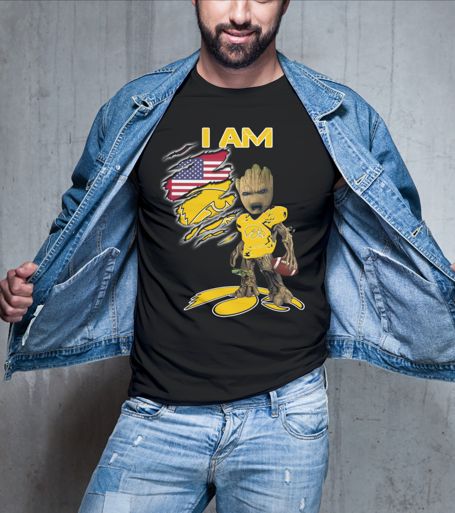 I Am Hawkeyes Baby Groot Holding Football With Usa Flag And Iowa Hawkeyes T-Shirt