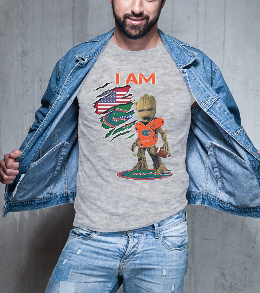 I Am Gators Baby Groot Holding Football With American Flag And Florida Gators T-Shirt