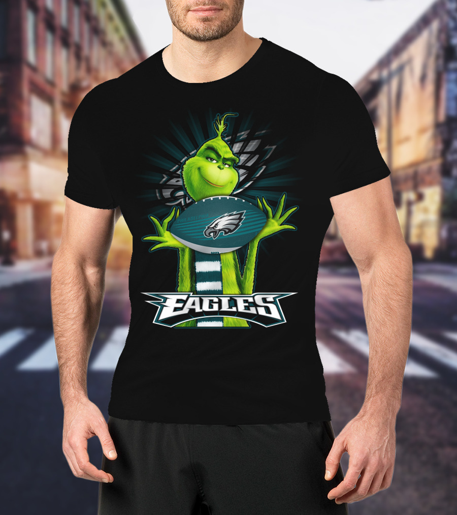 Grinch Holding Philadelphia Eagles Football With Team T-Shirt
