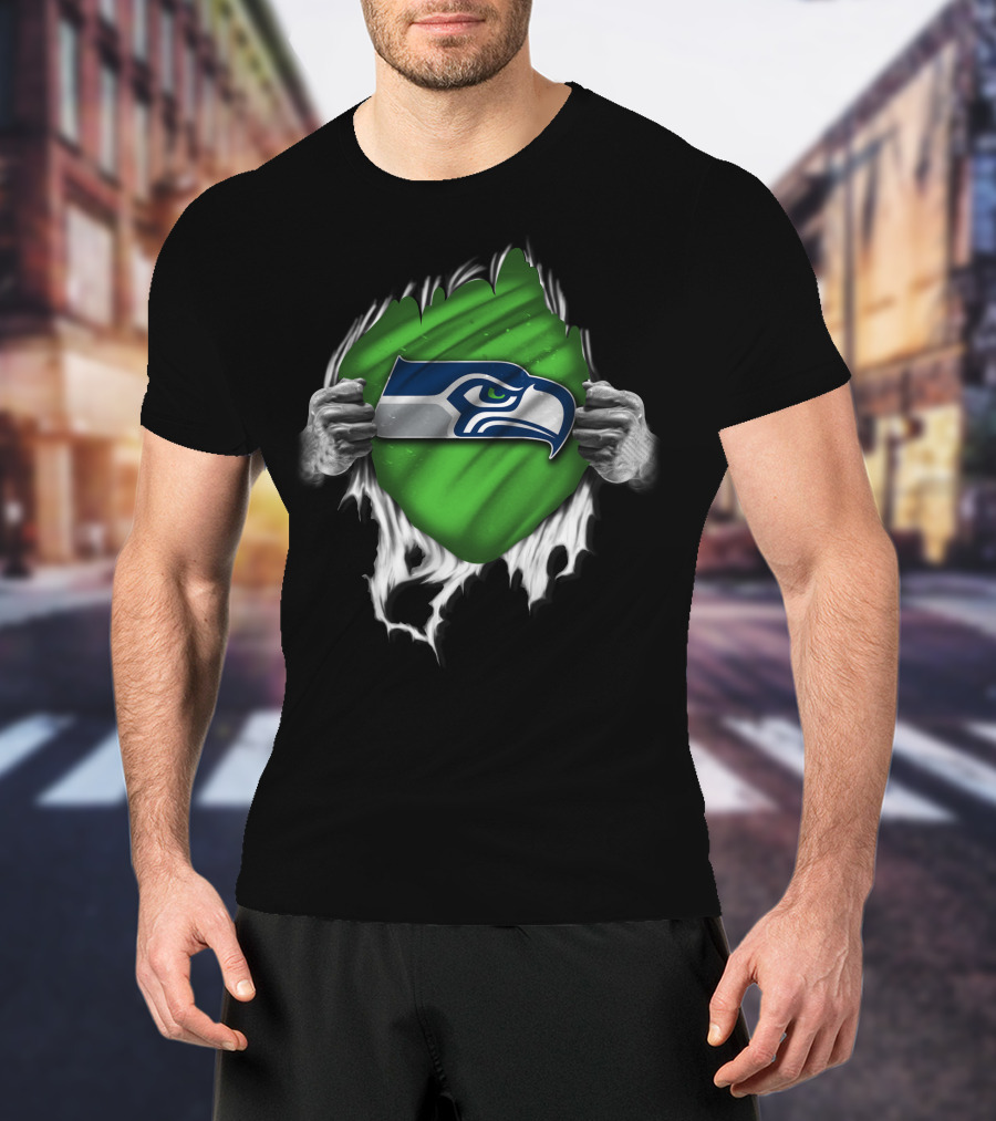 Torn Seattle Seahawks Logo With Green Background And Hands Peeling Fabric T-Shirt