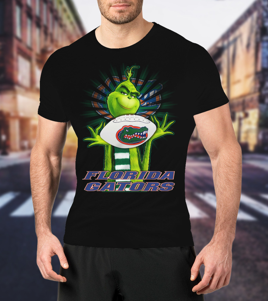 Grinch Holding Florida Gators Football T-Shirt