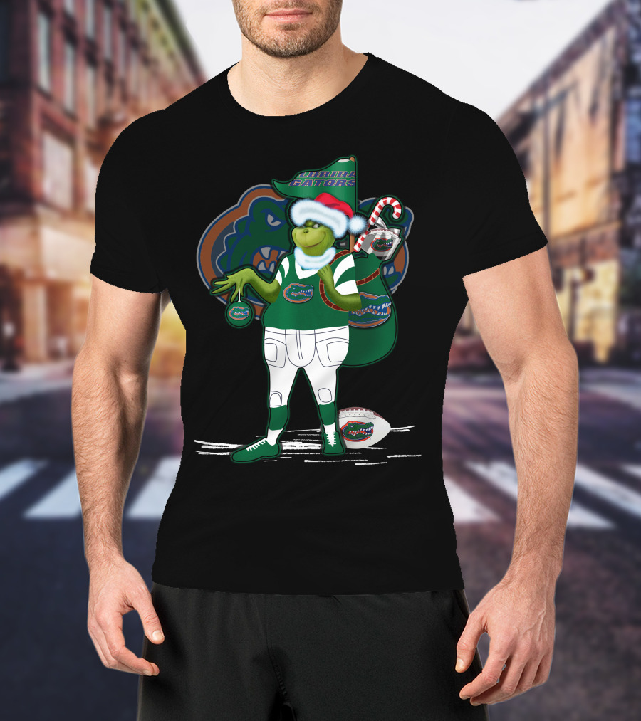 Grinchxmas Wearing Santa Hat Florida Gators With Gator Logo And Candy Cane T-Shirt