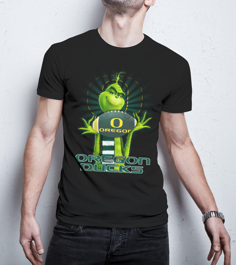 Grinch Holding Oregon Ducks Football T-Shirt