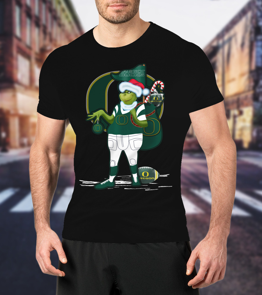 Oregon Ducks Grinch Santa With Candy Cane And Football T-Shirt