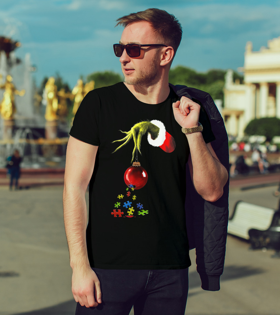 Grinch Hand Holding Red Ornament With Autism Puzzle Pieces T-Shirt