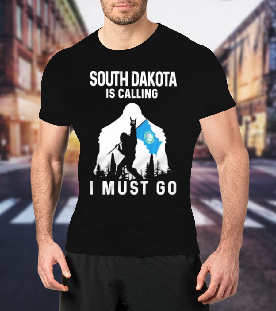 South Dakota Is Calling I Must Go Bigfoot Holding South Dakota Flag T-Shirt