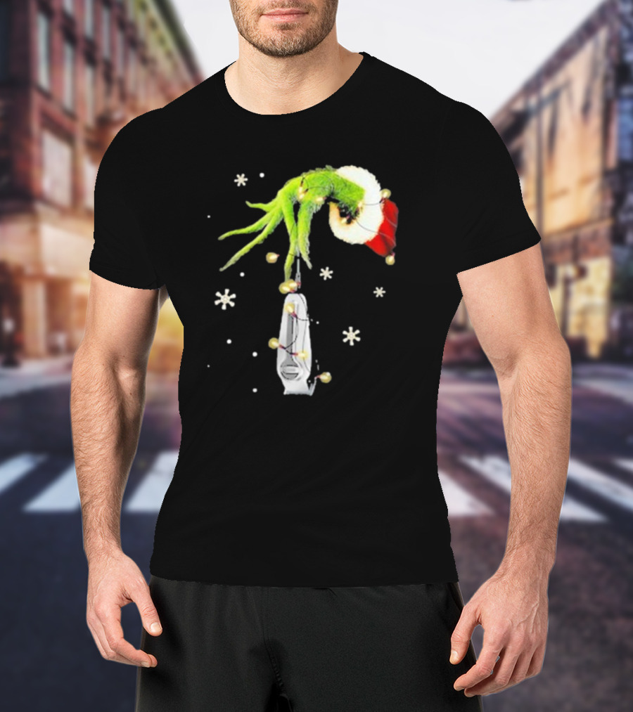 Grinch Christmas Hand Holding Clipper Snowflakes Santa Hat T-Shirt