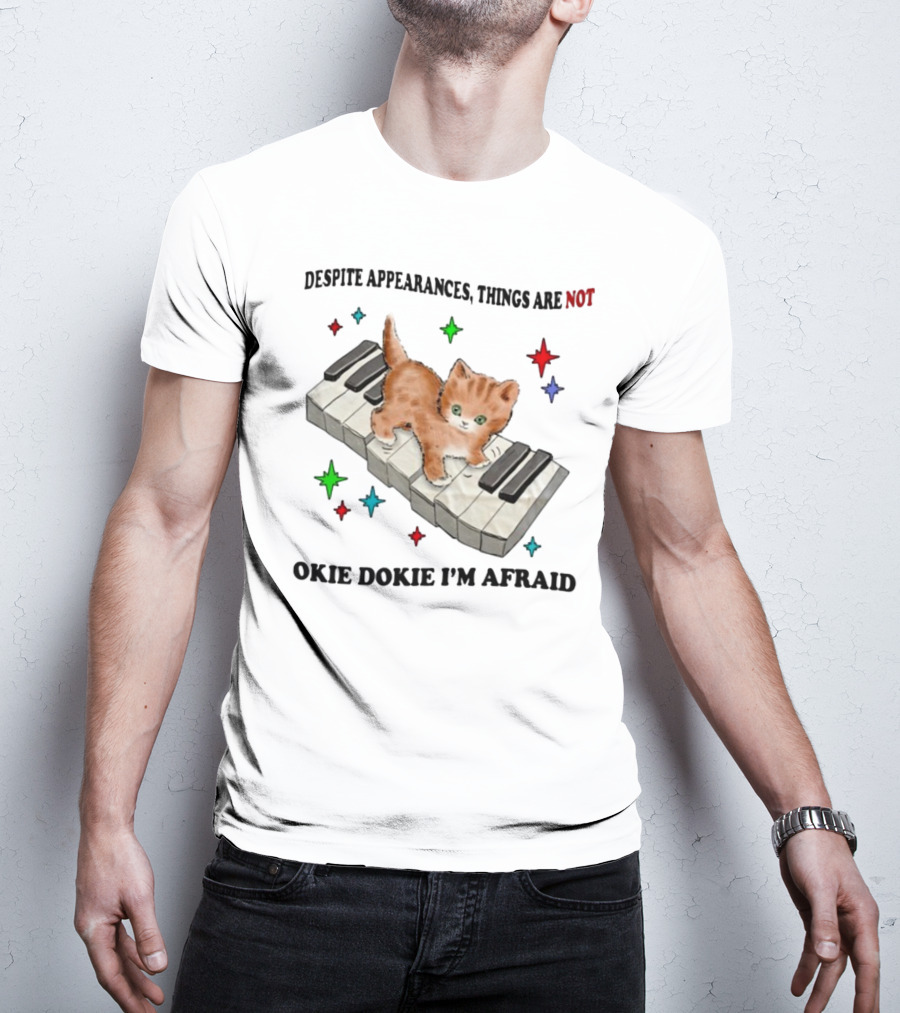 Despite Appearances Things Are Not Okie Dokie I'm Afraid Cat On Piano Keys With Colorful Stars T-Shirt