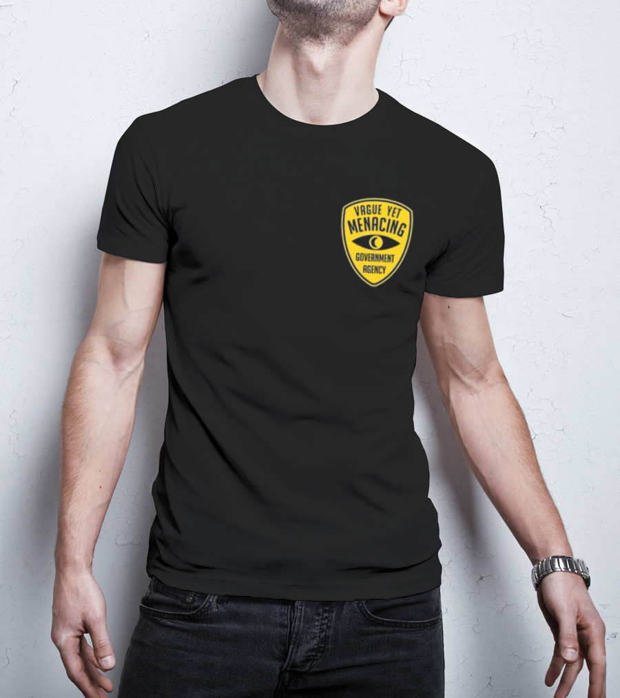 Vague Yet Menacing Government Agency Yellow Badge With Eye T-Shirt
