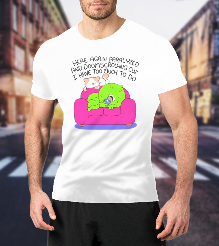Here Again Paralyzed And Doomscrolling Cuz I Have Too Much To Do Quirky Green Figure Relaxing On Pink Couch With Cute Dog T-Shirt