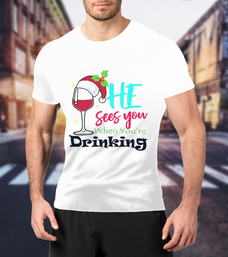 Santa Hat On Wine Glass With 'He Sees You When You're Drinking' Christmas Festive T-Shirt