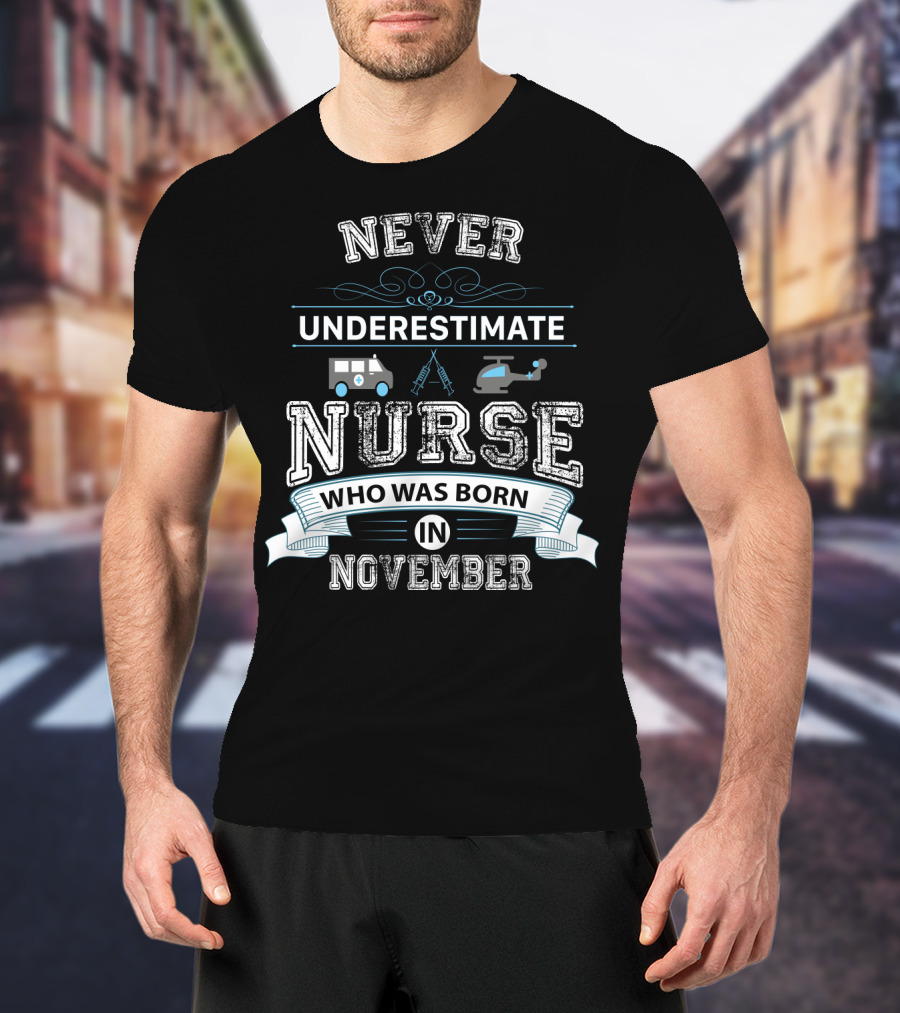 Never Underestimate A Nurse Born In November With Ambulance And Helicopter Elements T-Shirt