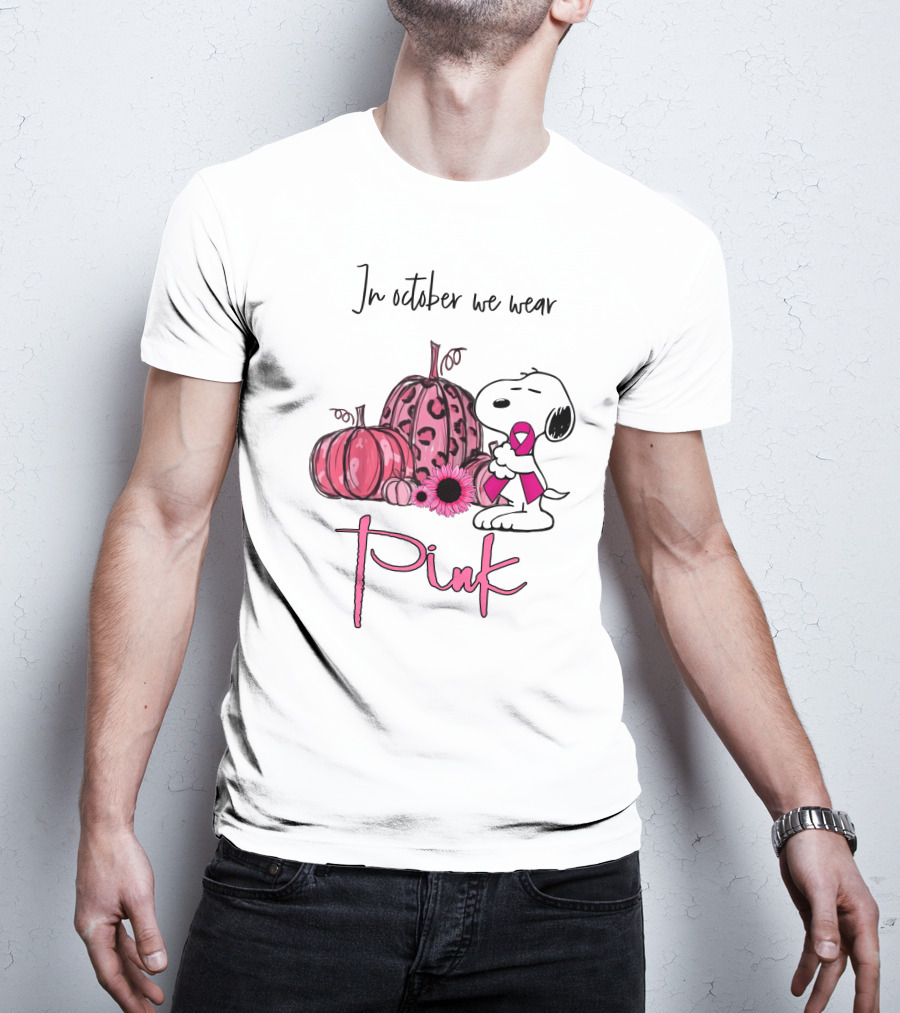 In October We Wear Pink With Peanuts Character Holding Ribbon And Pumpkins T-Shirt