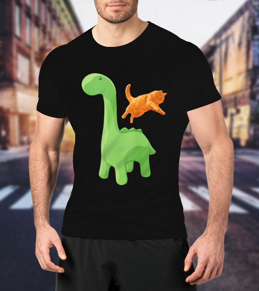 Cat Jumping Over Green Dinosaur Cartoon Image T-Shirt