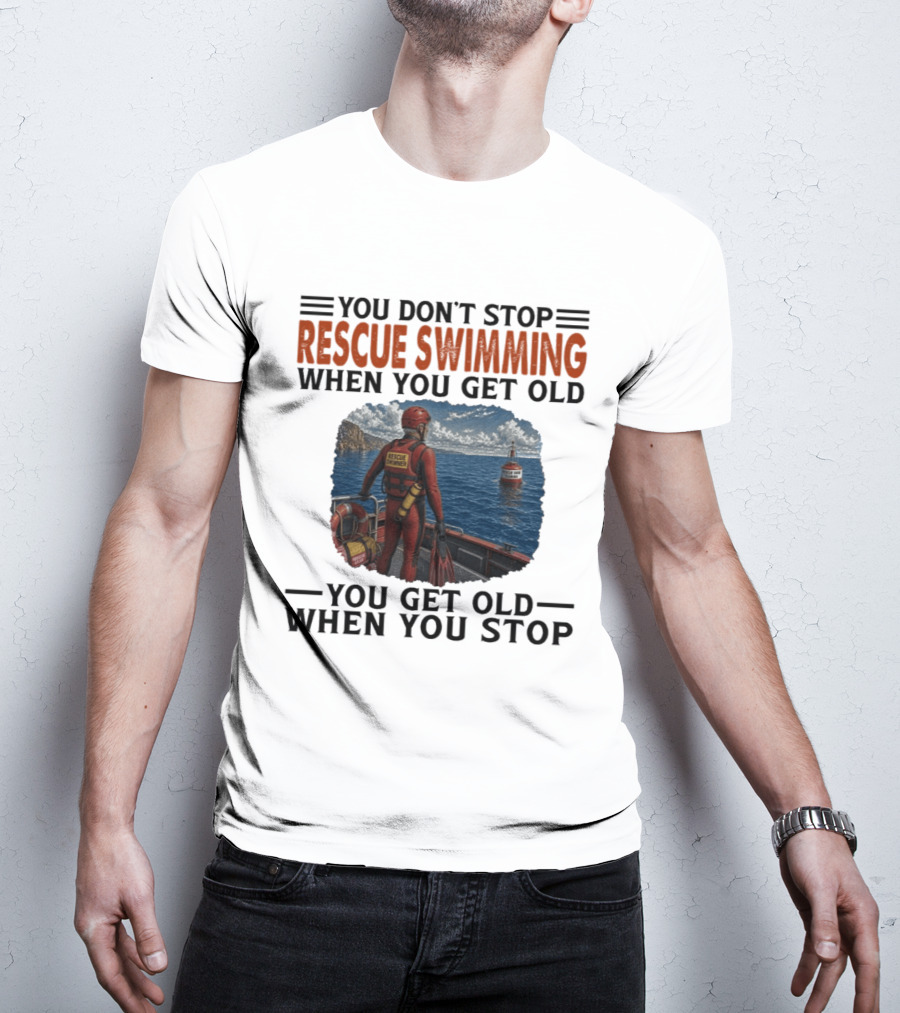 You Don't Stop Rescue Swimming When You Get Old You Get Old When You Stop Rescue Swimmer Standing On Boat Near Lighthouse T-Shirt