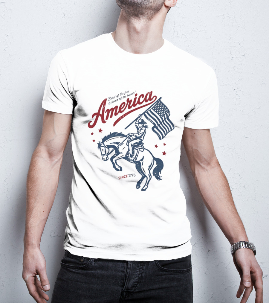 America Land Of The Free Home Of The Brave Since 1776 Cowboy Holding Flag Patriotic T-Shirt