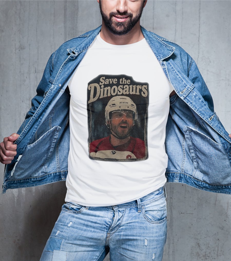 Connor Storrie Wearing Scott Hunter Save The Dinosaurs CCM Hockey T-Shirt