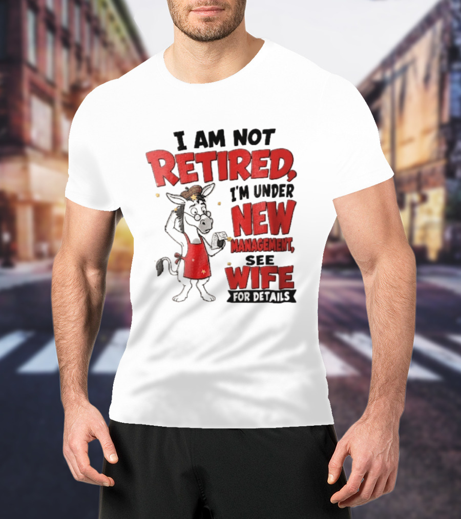 I Am Not Retired I'm Under New Management See Wife For Details Cartoon Donkey Red Apron T-Shirt