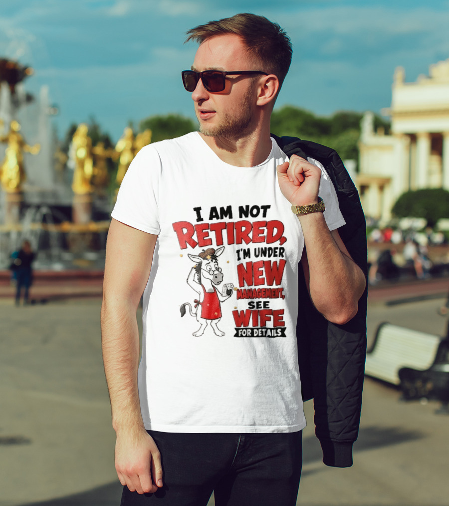 I Am Not Retired I'm Under New Management See Wife For Details Cartoon Donkey Red Apron T-Shirt