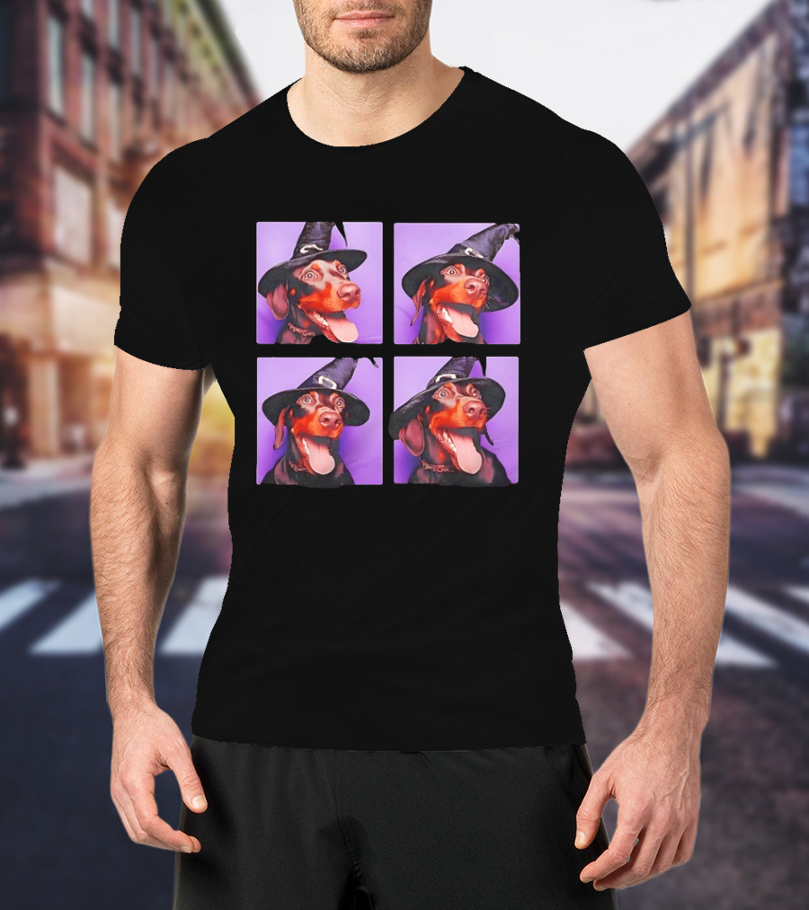 Doberman Pinscher In Witch Hat For Halloween With Purple T-Shirt