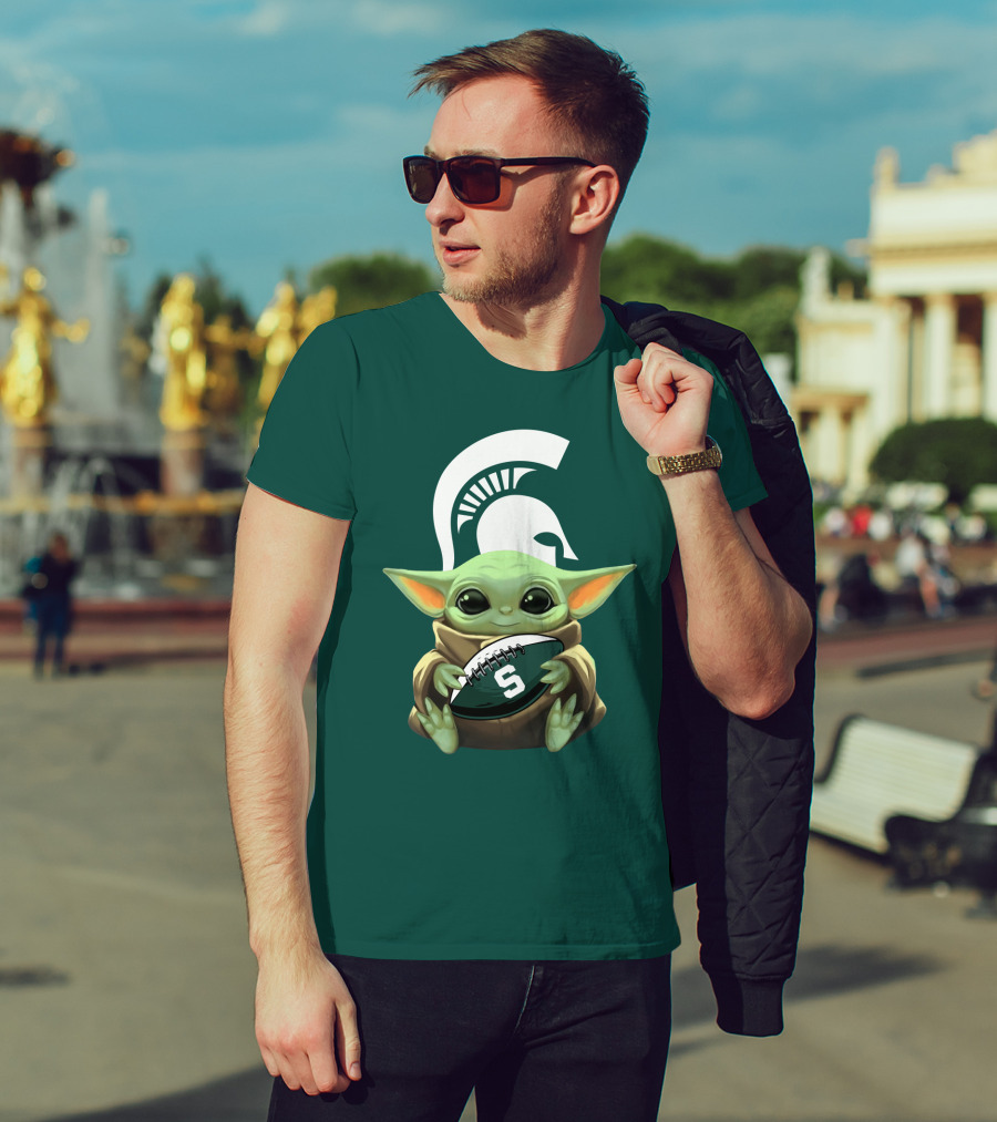 Baby Yoda Holding Football With Michigan State Spartans Helmet T-Shirt