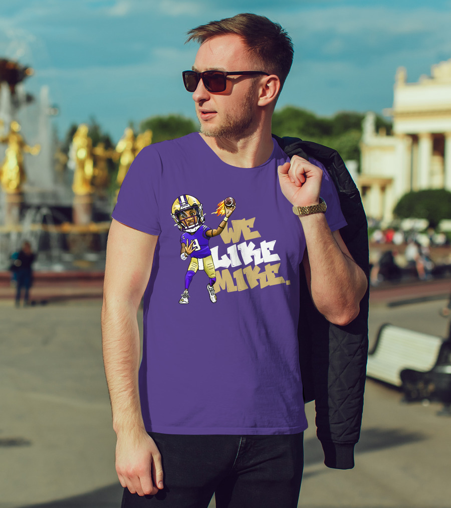 We Like Mike Football Character In Purple And Gold Gear Holding Flaming Ball T-Shirt