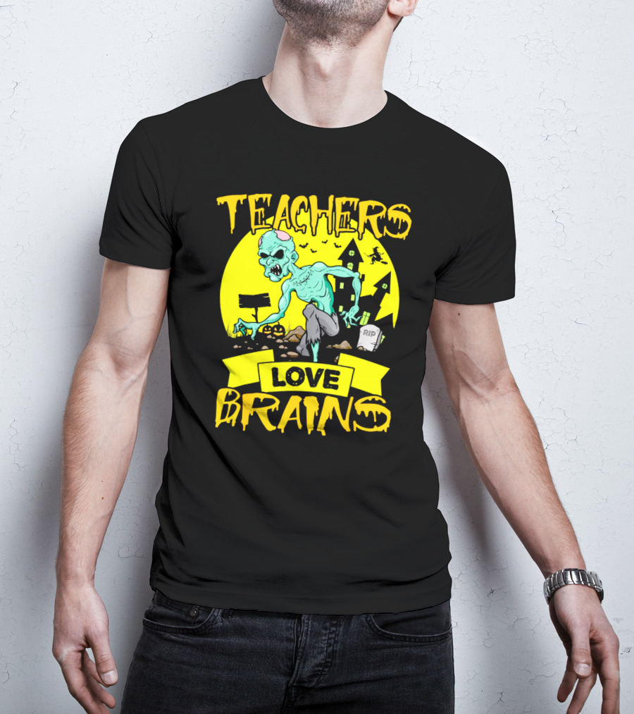 Teachers Love Brains Zombie Halloween Theme With Haunted Houses And Graveyard Background T-Shirt
