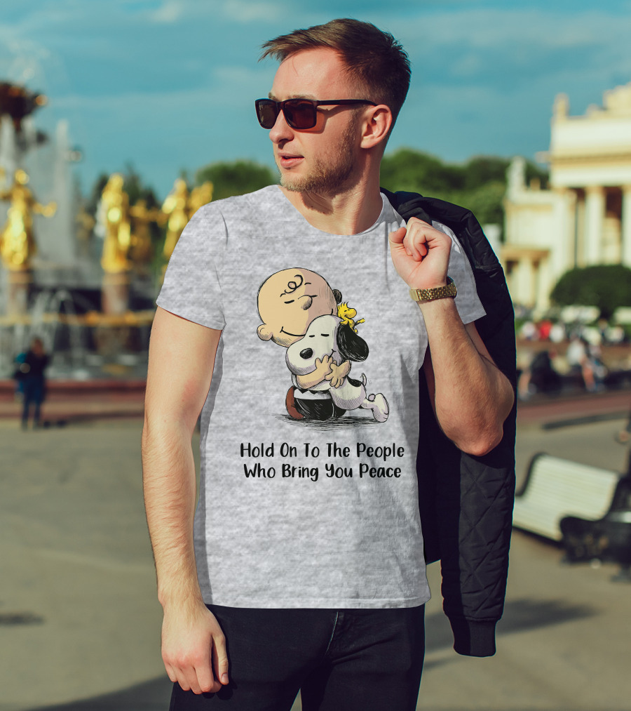 Hold On To The People Who Bring You Peace Charlie Brown Snoopy Woodstock Hug T-Shirt