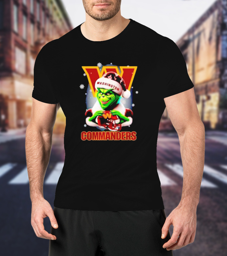 The Grinch Wearing Santa Hat Holding Gift For Washington Commanders Christmas T-Shirt