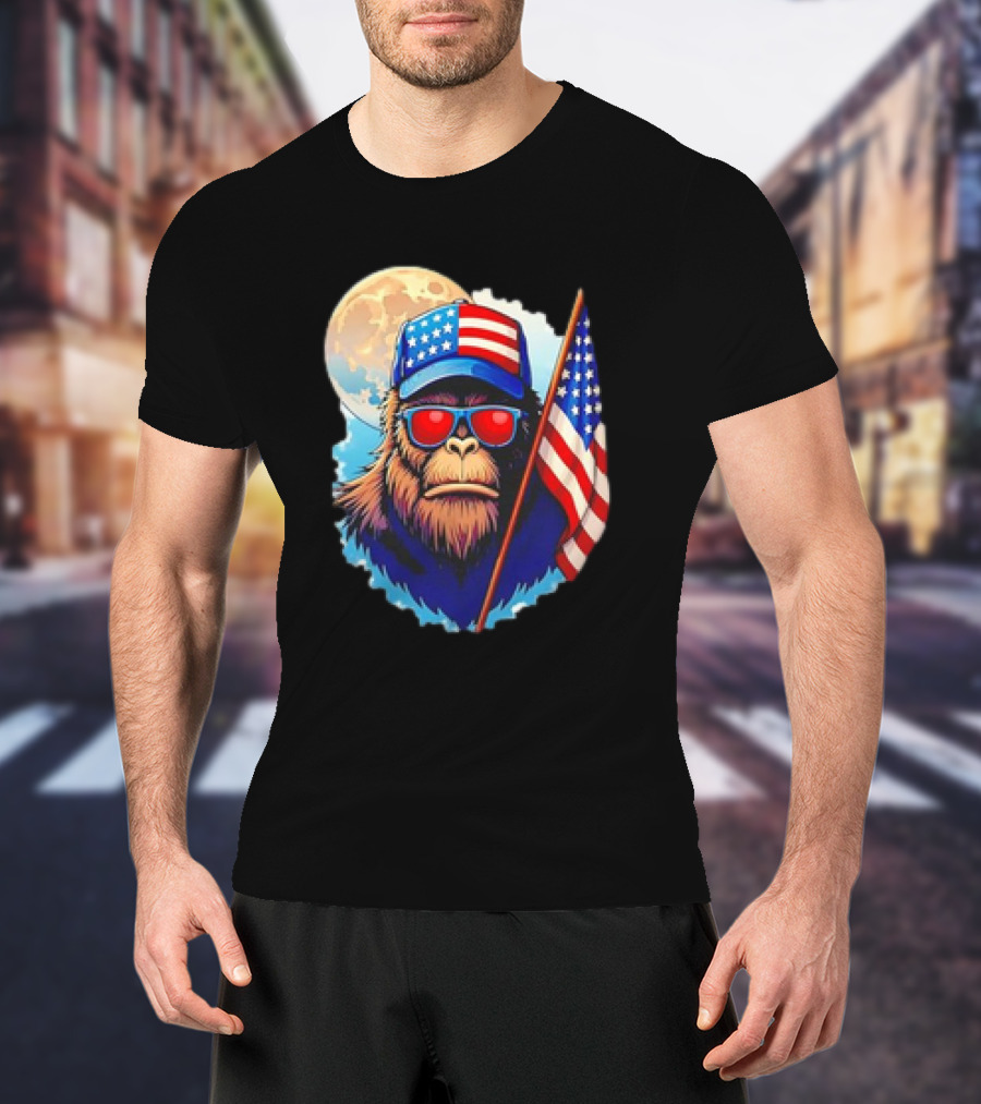 Bigfoot USA Flag Hat Sunglasses Patriotic Moon Background T-Shirt