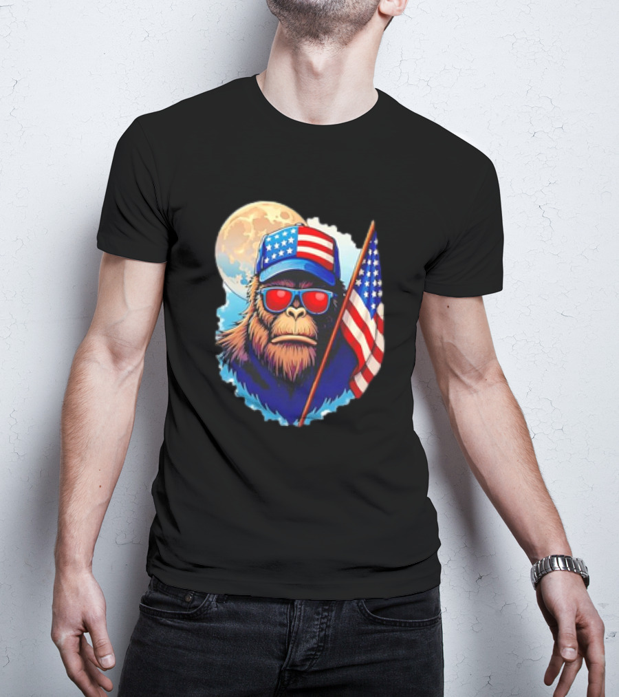 Bigfoot USA Flag Hat Sunglasses Patriotic Moon Background T-Shirt
