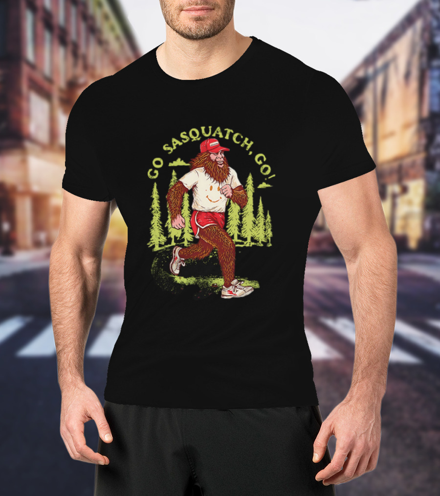Go Sasquatch Go Bigfoot Jogging In Forest With Red Cap And Sneakers T-Shirt