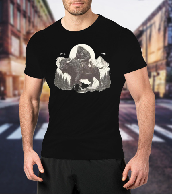 Blurry Creatures Bigfoot Riding Buffalo With Mountains And Moon In Background T-Shirt