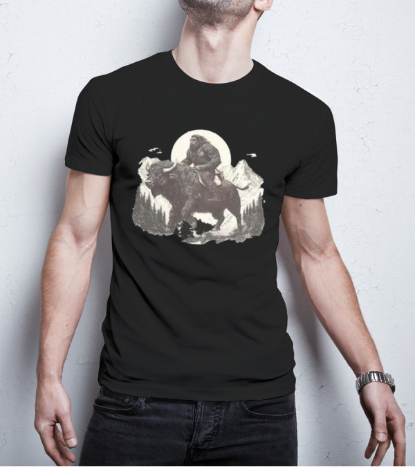 Blurry Creatures Bigfoot Riding Buffalo With Mountains And Moon In Background T-Shirt
