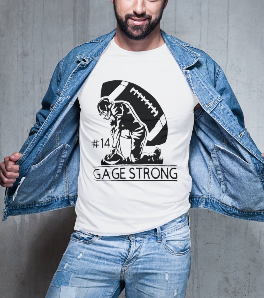Gage Strong #14 Football Player Kneeling In Front Of Large Football T-Shirt