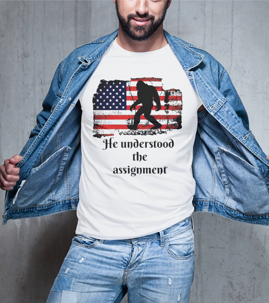 Bigfoot Silhouette With Distressed American Flag He Understood The Assignment T-Shirt