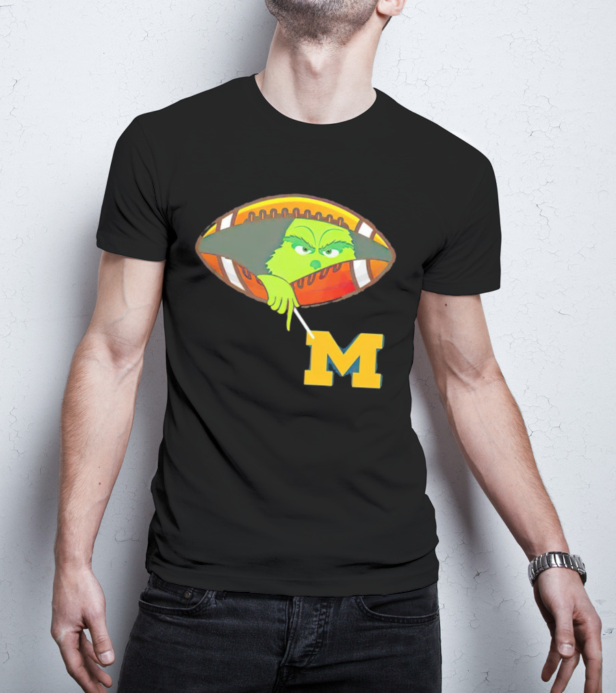 Grinch Peeking From Football Over Michigan Wolverines T-Shirt