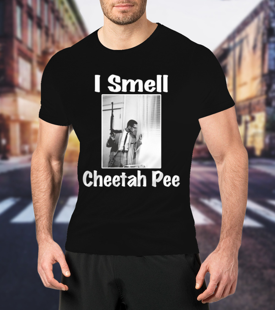 I Smell Cheetah Pee Man Holding Gun By Window T-Shirt