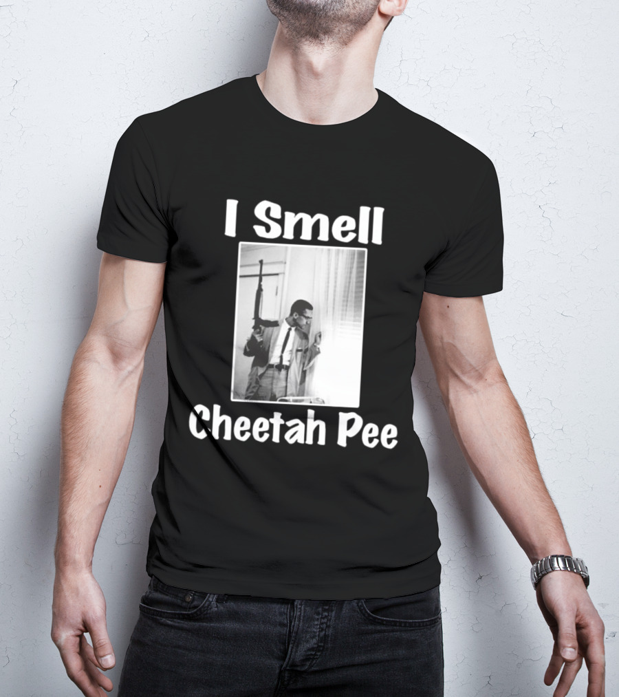 I Smell Cheetah Pee Man Holding Gun By Window T-Shirt