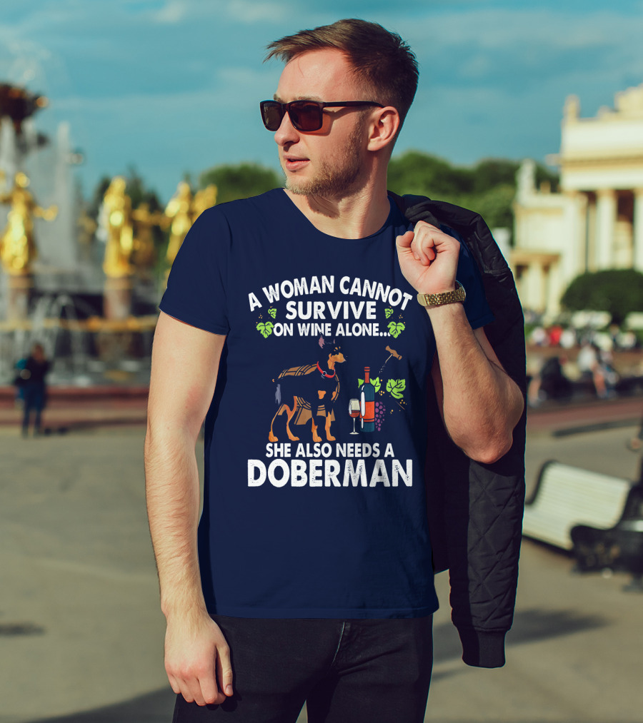 A Woman Cannot Survive On Wine Alone She Also Needs A Doberman T-Shirt