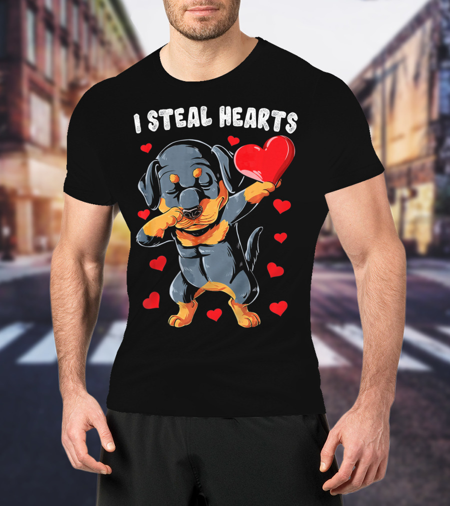 Dabbing Rottweiler Holding Heart Surrounded By I Steal Hearts Text T-Shirt
