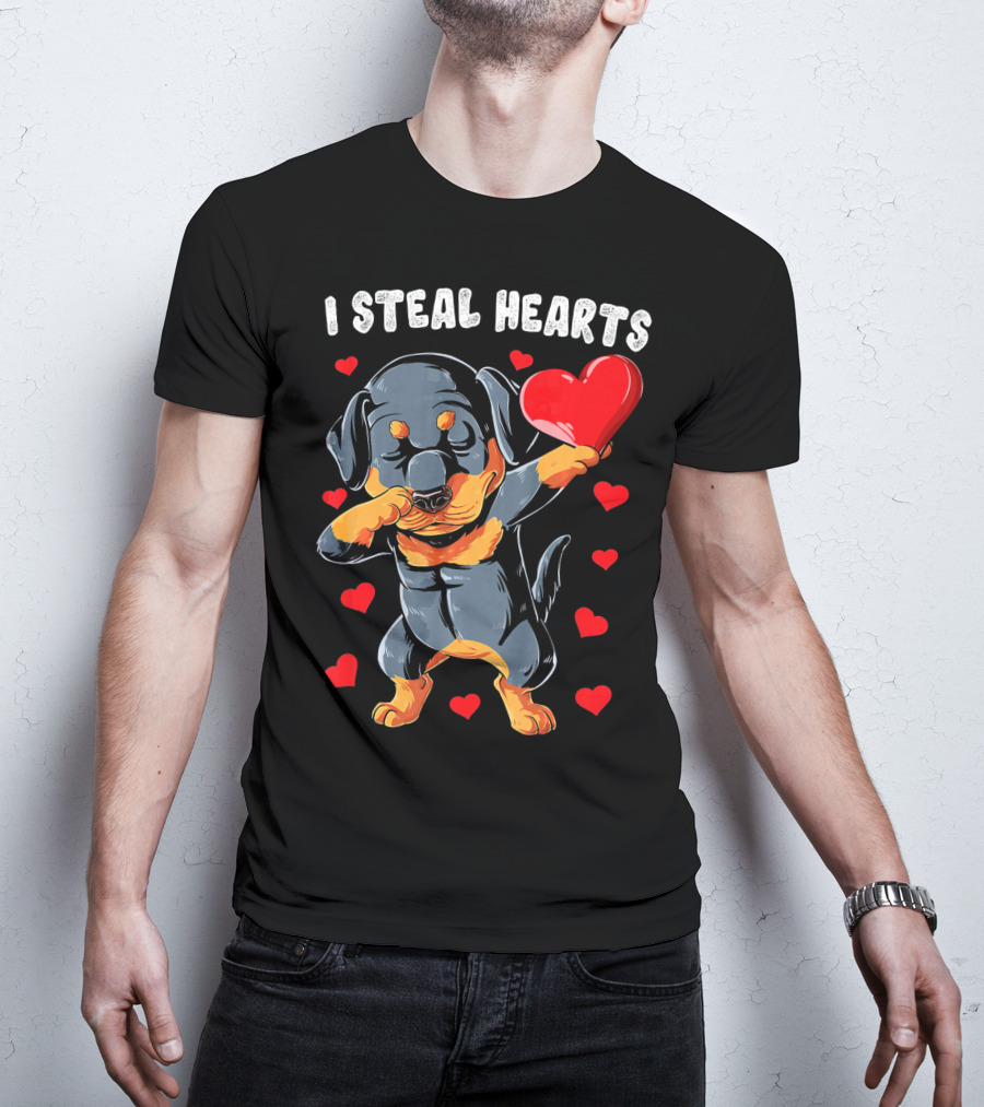 Dabbing Rottweiler Holding Heart Surrounded By I Steal Hearts Text T-Shirt