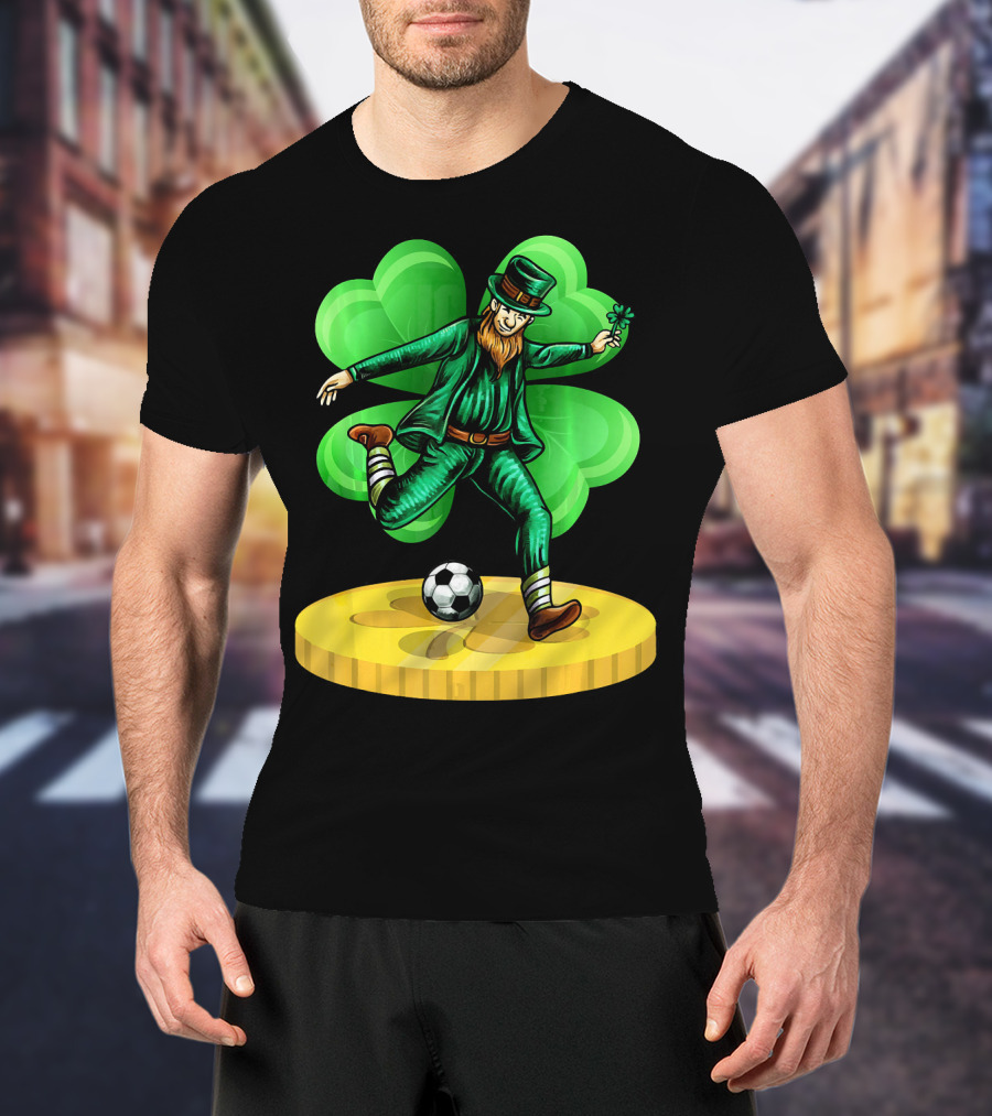 Leprechaun Kicking Soccer Ball On Gold Coin With Shamrock Background T-Shirt