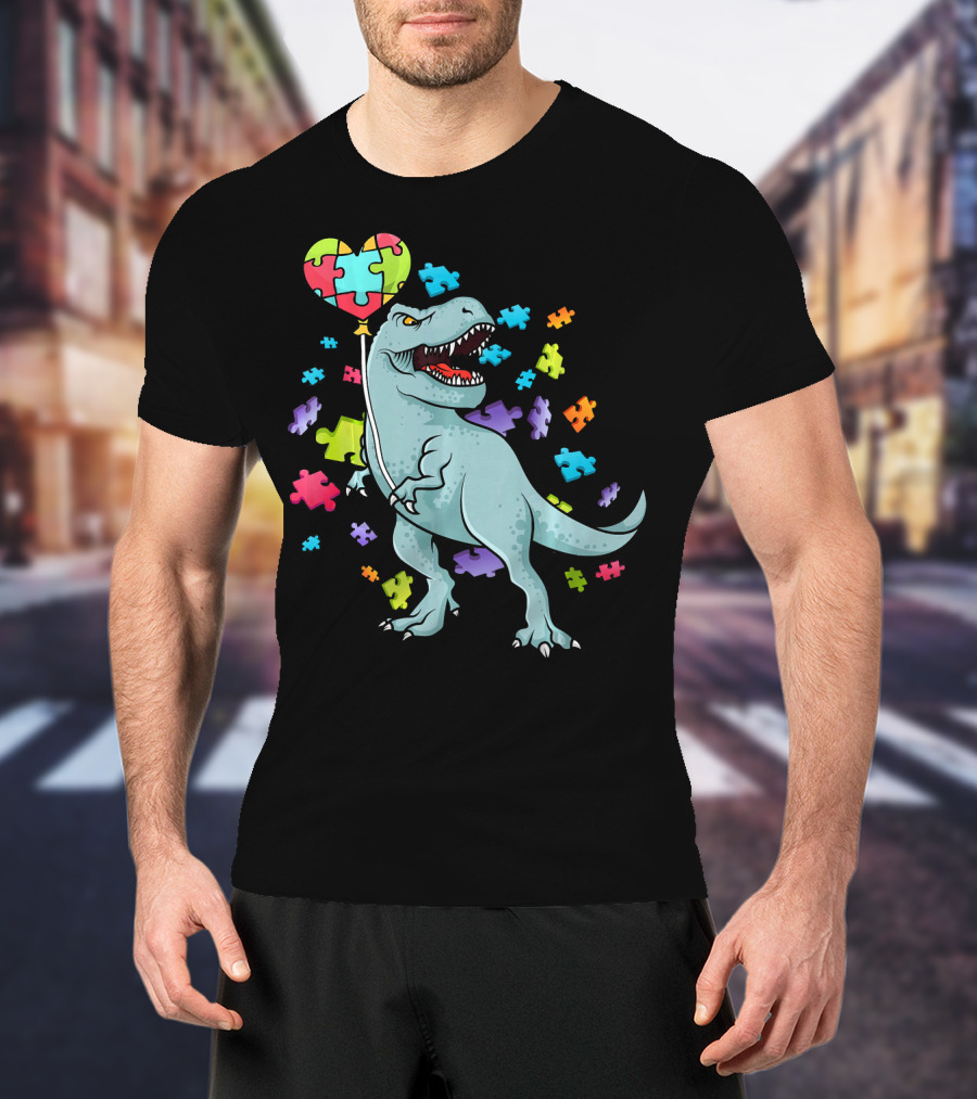 Autism Awareness Dinosaur With Puzzle Heart Balloon And Colorful Puzzle Pieces T-Shirt